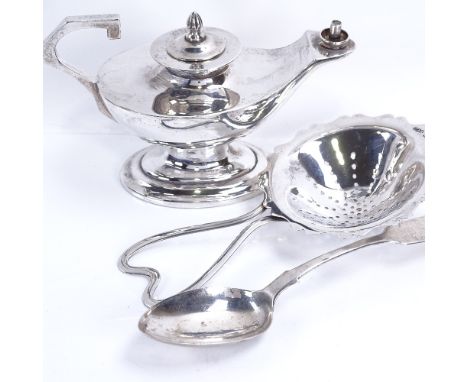 Various silver and plate, including stylised silver tea strainer, Scottish Fiddle pattern teaspoon, and a plated Aladdin desi
