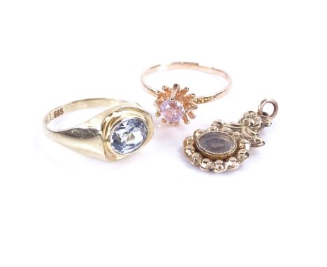 3 pieces of jewellery, including 14ct gold aquamarine ring, 14ct pink glass ring, and a small 14ct locket pendant, ring sizes