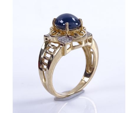 A modern 9ct gold cabochon sapphire and diamond dress ring, setting height 13.9mm, size N, 5.1gGood original condition, all s