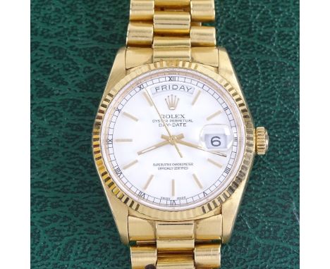 ROLEX - an 18ct gold Oyster Perpetual Day-Date automatic wristwatch, ref. 18038, circa 1986, white dial with gilt baton hour 