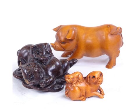 3 Japanese carved wood pig netsuke, largest length 5.5cm (3) 