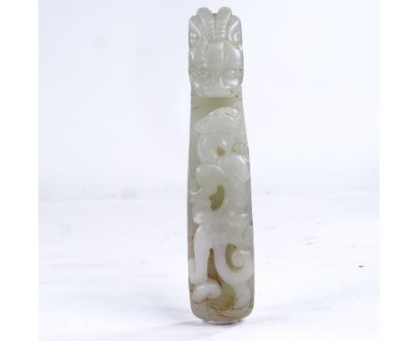 A Chinese relief carved jade dragon design buckle, length 11.5cm 