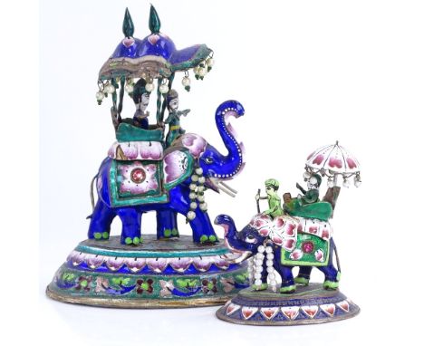 2 early 20th century Indian silver and enamel caparisoned elephant models with howdah and 2 passengers, largest height 13cm (