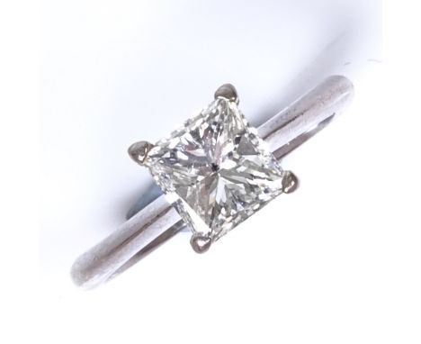 A 1ct Princess-cut solitaire diamond ring, set in plain 4-claw 18ct white gold settings, colour approx J/K, clarity approx SI