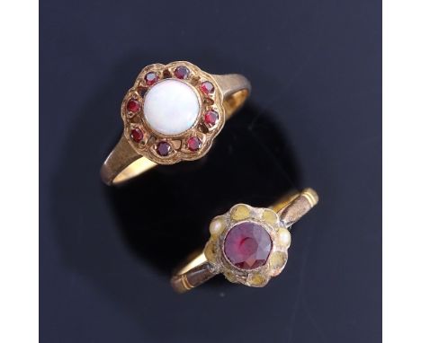 A 22ct gold garnet and pearl cluster dress ring, setting height 8.9mm, size M, 2.9g, and a 9ct cabochon opal and garnet clust