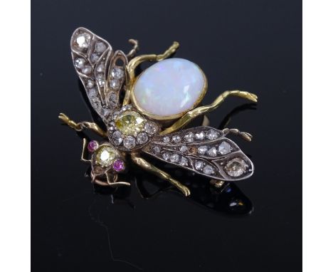 A large opal "yellow" diamond ruby and diamond figural bug pendant/brooch, set with large cabochon opal, old-cut and rose-cut