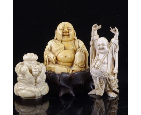 An Antique Chinese carved ivory seated Buddha on hardwood stand, height 10cm, an ivory Buddha with outstretched arms, and a 1