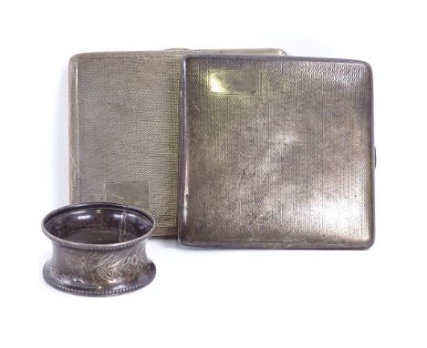 2 engine turned silver cigarette cases and a silver napkin ring, largest case length 10cm, 8.4oz total (3)All in very good or