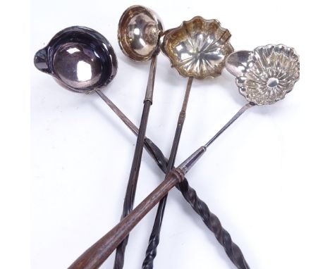 A large quantity of silver and silver plated toddy ladles and sifter spoon, including models with twisted whale baleen handle