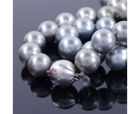 A single-row grey cultured South Sea pearl and diamond necklace, comprising a graduated row of 33 grey cultured Tahitian pear