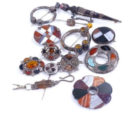 A group of Antique and Vintage Scottish silver and hardstone brooches, including penannular and dirk examplesGenerally used c
