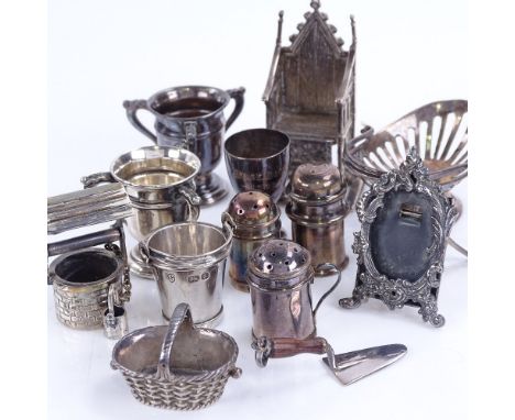 A quantity of various silver doll's house items, including throne chair, well bucket, strut photo frame, chalice, tig etcGene