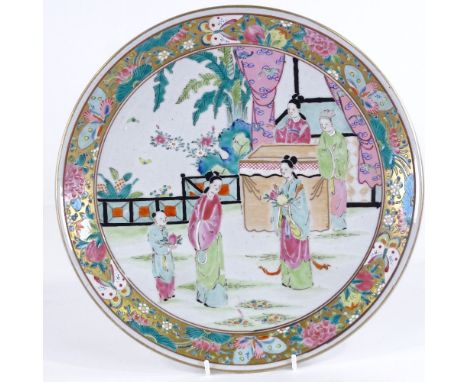 A Chinese porcelain plate with painted enamel figures, diameter 31cm 