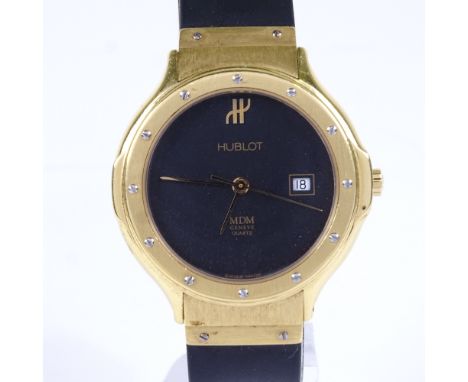 HUBLOT - a mid-size 18ct gold Classic MDM Geneve quartz wristwatch, ref. 140.10.3, black dial with date aperture, screw hour 