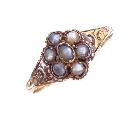 A 19th century 12 1/2ct gold split pearl cluster memorial ring, allover foliate engraved shank with vacant panel back, settin