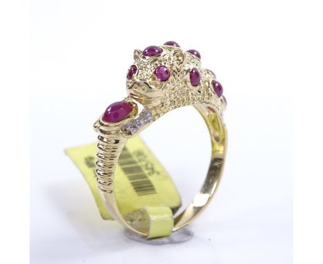 A 14ct gold cabochon ruby and diamond panther ring, setting height 8.1mm, size M, 3.5gGood overall condition, all stones pres