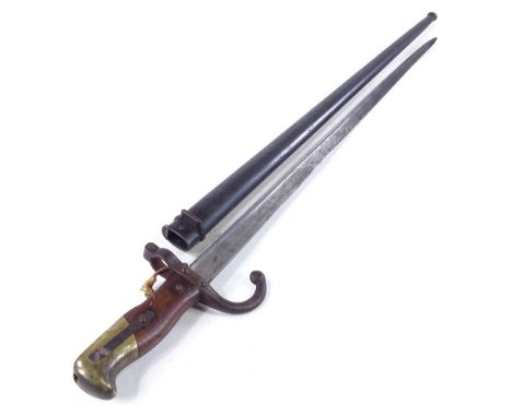 A 19th century French sword bayonet, inscribed L Deny Paris 1878, original metal scabbardIn good condition.Stamped on hilt an