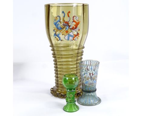 A large Continental amber glass vase with painted enamel armorial crest and applied twist decoration, height 30cm, and 2 othe