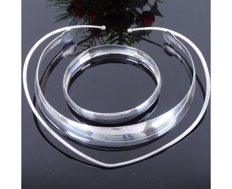 2 Danish silver neck torques and a similar plain form bangle, internal lengths 125mm and 110mm, bangle internal diameter 66mm