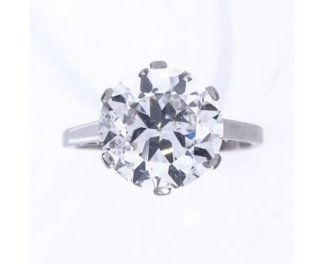 A 5.37ct solitaire diamond ring, the round brilliant-cut stone in plain 4-claw platinum setting, colour approx F/G, clarity a