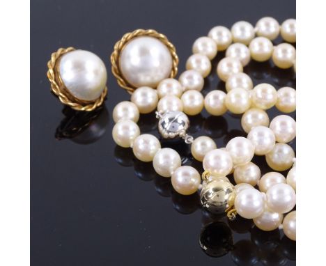 A pair of 9ct gold mabe pearl earrings, and a matching cultured pearl and bracelet set (3)Generally good original condition, 