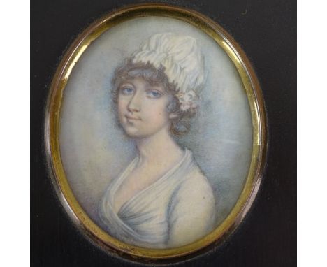 A 19th century miniature watercolour on ivory, portrait of a woman in ebonised frame, overall frame size 5" x 4"Good conditio