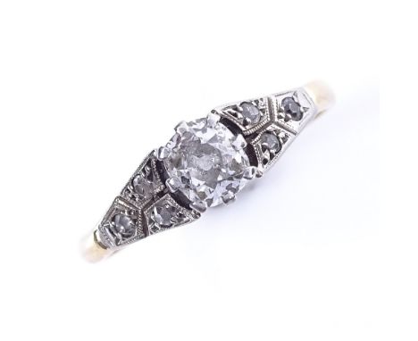 An early 20th century 18ct gold 0.4ct solitaire diamond ring with diamond set shoulders, setting height 6.1mm, size Q, 2.7gGo