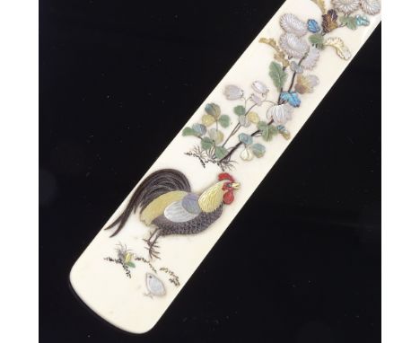 A fine quality Japanese ivory and Shibayama page turner, Meiji Period, decorated with mother-of-pearl, abalone, jade and cora