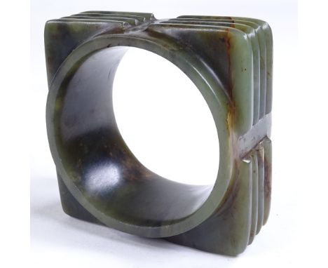 A Chinese carved jade cong, 8cm across 