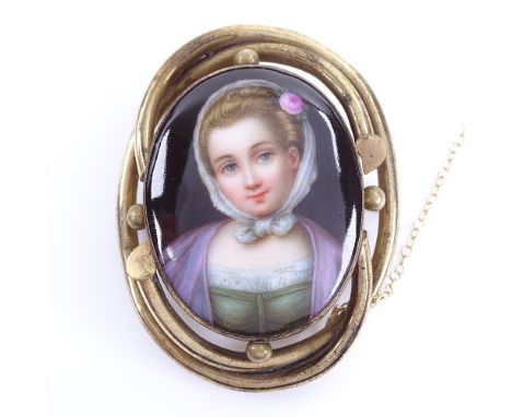 A 19th century miniature hand painted watercolour portrait on porcelain brooch, depicting a young lady, in gilt-metal frame, 