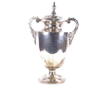 A large and impressive George V solid silver 2-handled trophy, with scrolled riveted style handles, with later cover, by Will