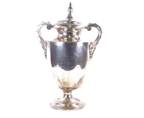 A large and impressive George V solid silver 2-handled trophy, with scrolled riveted style handles, with later cover, by Will