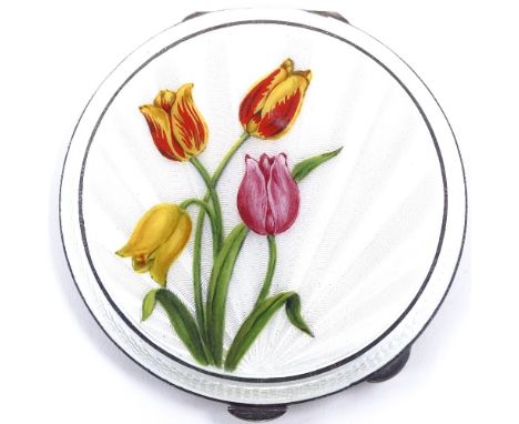 An Elizabeth II silver and enamel circular compact, engine turned sunburst decoration with hand painted tulips, by Henry Clif
