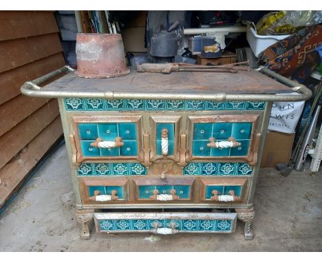 Vintage European cast iron tiled kitchen wood/coal burning stove. Buyer needs to collect from PE38 