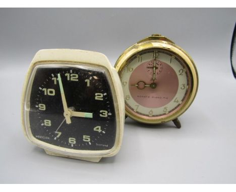 Schats piano tic alarm clock and one other