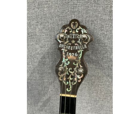 A Gretsch Orchestrella four string banjo, mother of pearl scrolled inlay to headstock with ‘GRETSCH ORCHESTRELLA 1926’, remov