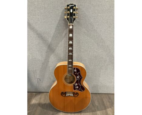 A Gibson SJ-200 electro-acoustic guitar, circa 2008, mother of pearl inlay, serial no. 01538004, indentation to binding on sh