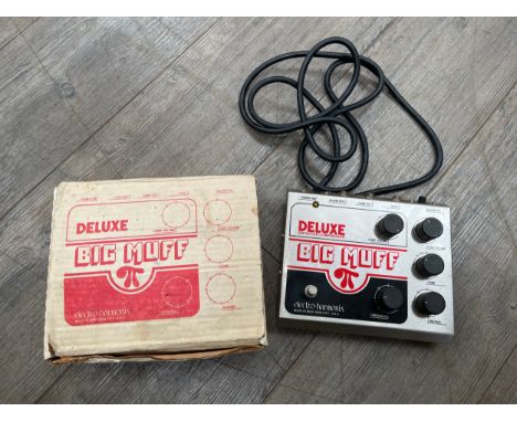 A 'Big Muff' electric guitar effects pedal, boxed   COLLECTOR'S ELECTRICAL ITEM: Item untested 