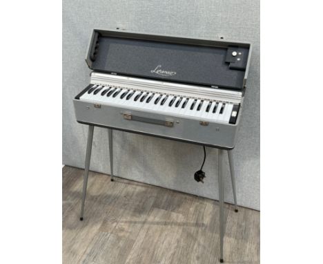 A 1960's Lorenzo organ, cased with legs   COLLECTOR'S ELECTRICAL ITEM: Item untested 