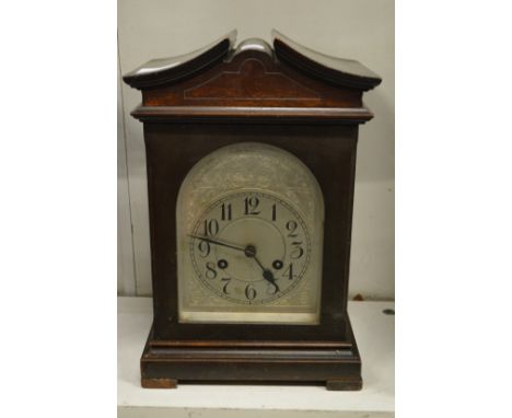 A mahogany cased mantle clock.
