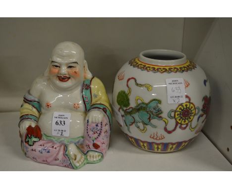 A colourful pottery model of a seated buddha and a colourful ginger jar.