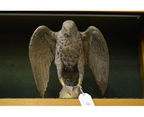 A large cast brass model of an eagle.