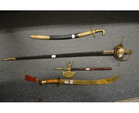 Various reproduction swords and an axe.