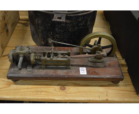 Brass and mahogany model of a stationary engine.