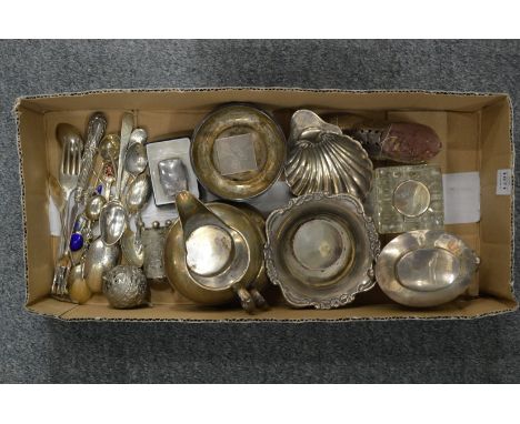 A collection of small silverware to include a tea caddy, boot shaped pin cushion, ink well etc.