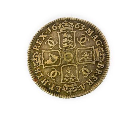 Charles II, Shilling 1663, first draped bust, rev. crowned cruciform shields with interlaced C’s in angles; obv. several scra