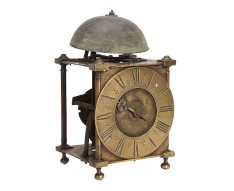  A Queen Anne brass lantern clock John Michell, Chardstock, early 18th century  The posted countwheel bell-striking movement 