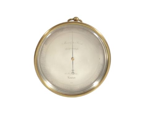  A Victorian lacquered brass aneroid barometer Murray and Heath, London, circa 1860  The 4.25 inch circular silvered register