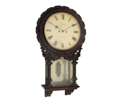  An unusual Victorian carved walnut striking drop-dial wall clock Samuel Bailey, Newcastle-on-Tyne, circa 1855  The four pill