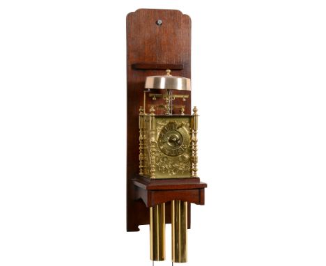  A Japanese engraved brass  Kake-Dokei   lantern clock with double foliot regulation and alarm Unsigned, mid to late 19th cen